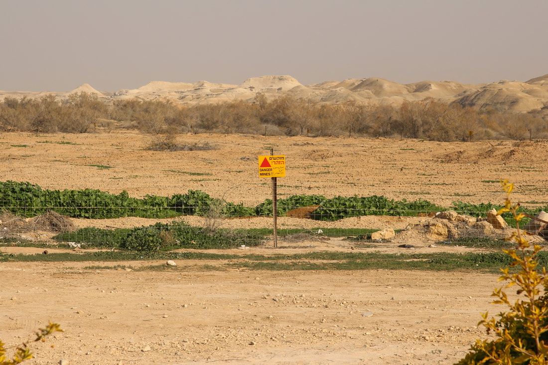 Land mines surrounding the baptismal site - vacation planning in Israel