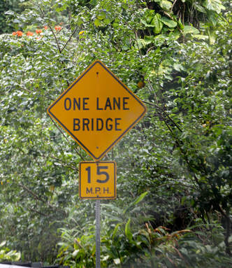 One Lane bridge sign
