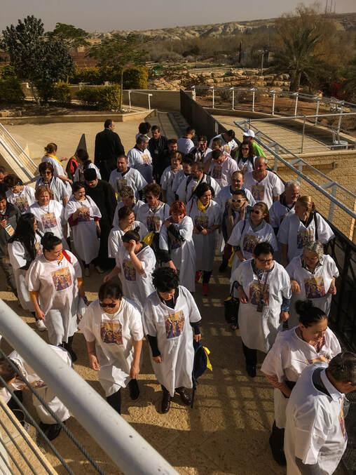 Visitors waiting to be baptized - Israel vacation planning