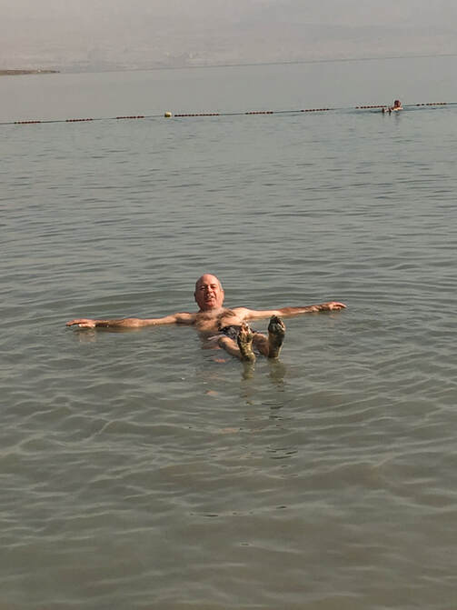 Floating in the Dead Sea - Israel Trip Planning